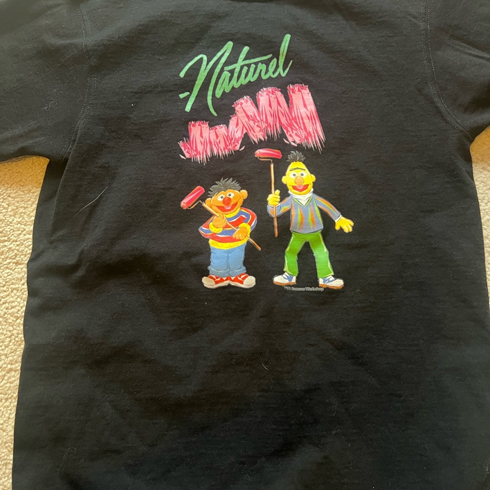 Champion Women’s Black Graphic Tee with Colorful Design